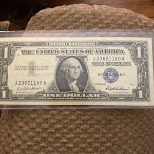 1957 Silver Certifícate in AU Shape will come on plastic sleeve to protect it.